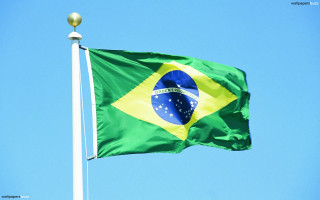 Flag flying blue sky gold - international typographic style free wallpaper