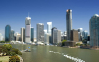 Boat river city skyline tall 3 - tilt shift free wallpaper