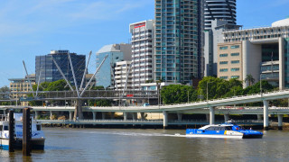 Boat city river buildings bridge - the water free wallpaper
