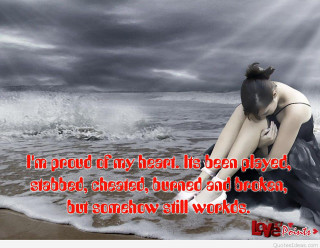Woman kneeling beach message love - somber free wallpaper