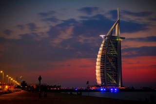 Tall building tall spire night - a tall building free wallpaper