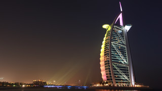 Tall building colorful top night - a tall building free wallpaper