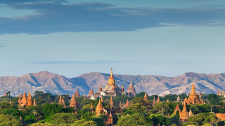 Buildings forest mountains blue sky - panoramic free wallpaper for desktop