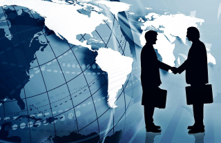 Handshake world map blue background - two person free wallpaper