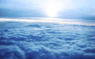 Sky airplane window clouds sun - cloud below free wallpaper