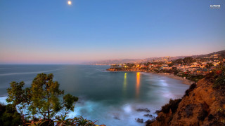 Beach full moon city horizon - a view of a beach free wallpaper