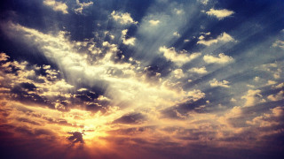 Sunset clouds sunrays ocean boat - a sunset free wallpaper