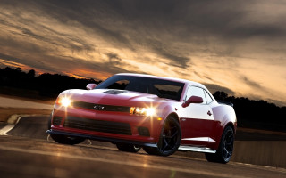 Red car sunset cloudy sky - a red car free wallpaper