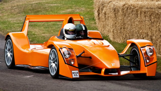 Man orange racecar road hay - a road next free wallpaper
