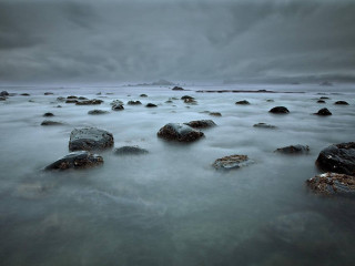 Rocks beach cloudy sky background 2 - a group of rocks free wallpaper
