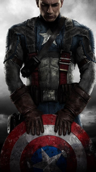 Captain america costume man holding 4 - a man in a captain america costume holding free wallpaper