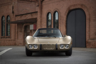 Tan sports car brick building - ed roth free wallpaper
