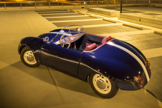 Blue car pink interior night - a person in the driver seat free wallpaper