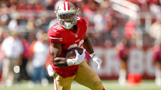 Football player running ball crowd 8 - his hand and a crowd free wallpaper