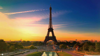 Eiffel tower paris sunset reflection - a reflection of the sun free wallpaper