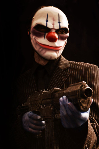 Clown gun suit mask holding - a suit free wallpaper