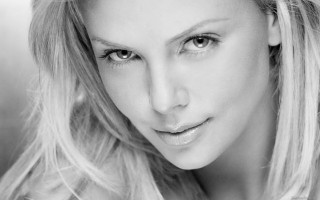 Blonde woman smiling wind portrait 2 - facial feature free wallpaper