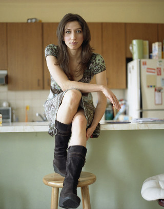 Woman sitting kitchen laptop Arabella - postminimalism free wallpaper