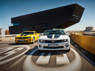 Two cars driving bridge background - tilt shift free wallpaper