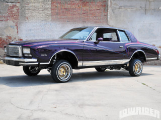 Purple car brick wall parked - a purple car free wallpaper
