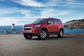 Red chevrolet suv ocean road - a road near the ocean free wallpaper