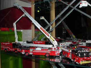 Fire trucks shelf table room - a table in a room free wallpaper
