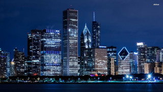 City skyline night lights water 10 - a body of water in front free wallpaper