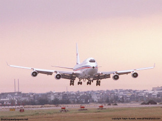 Jetliner cloudy sky city skyline 2 - building free wallpaper