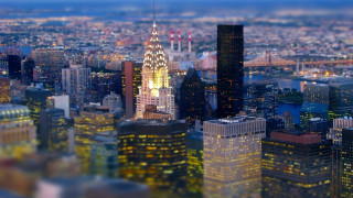 Cityscape tall building night lights - tilt shift free wallpaper