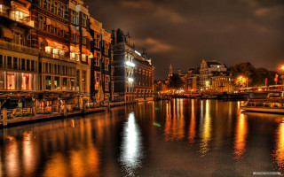 River buildings night lights reflection - a bunch of buildings free wallpaper