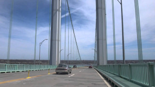 Car driving bridge sunny day - blue sky free wallpaper