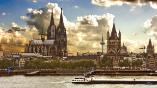 Boat river city skyline church - a church in the background free wallpaper