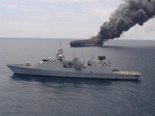 Large ship smoke ocean background - arie smit free wallpaper