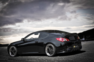 Black sports car cloudy sky 7 - a parking lot under a cloudy sky free wallpaper