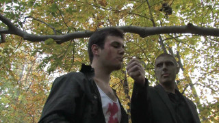 Two men standing tree knife - one man holding free wallpaper
