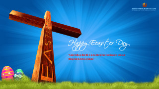 Wooden cross easter egg grass - a blue sky background free wallpaper