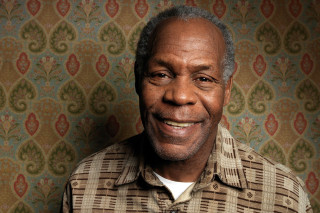 Smiling man wallpaper floral pattern - free portrait wallpaper