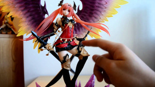 Hand holding toy doll figure - the other hand free wallpaper