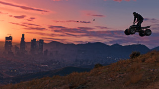 Man riding fourwheeler hill sunset - top of a hill free wallpaper