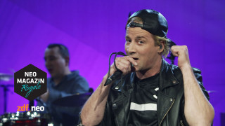 Man leather jacket singing microphone - a purple background free wallpaper
