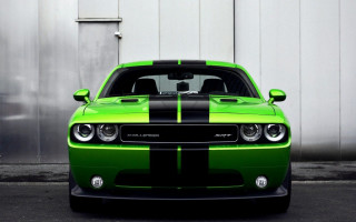Green black car parked building - car free wallpaper