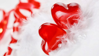 Red hearts feathery surface red - a red light in the background free wallpaper