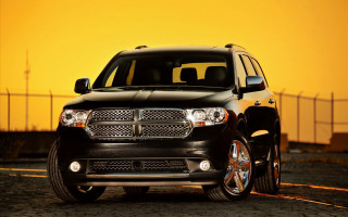 Black suv parked road sunset - a black suv free wallpaper