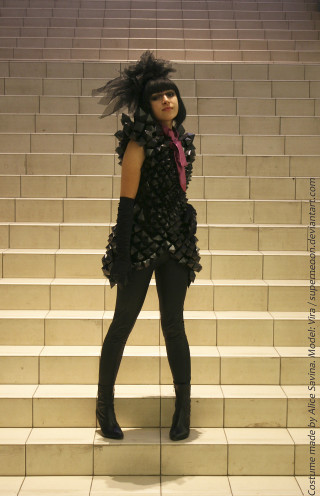 Woman standing stairs costume feathers - a costume free wallpaper