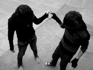 Two people holding hands walking - the other hand free wallpaper
