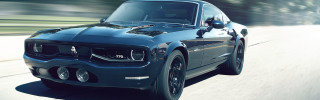 Blue mustang driving road forest - a forest of trees and bushes free wallpaper