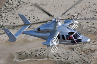 Helicopter flying sandy area sky - a helicopter free wallpaper
