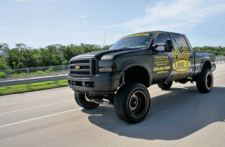 Truck driving highway yellow black - a highway free wallpaper