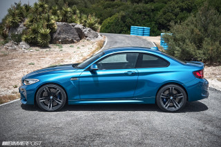Blue bmw car parked road - the side of the road free wallpaper
