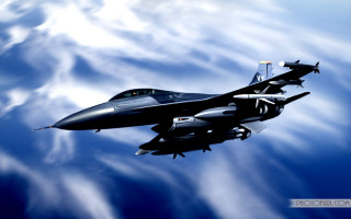 Jet flying cloudy blue sky 2 - a cloudy blue sky free wallpaper